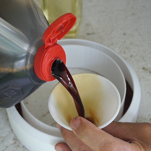 Filling Bug Moat Trap with Soy Sauce and Oil